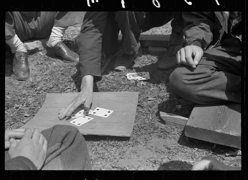 Coal miners playing cards during May 1939 strike. Sourced from the Library of Congress.