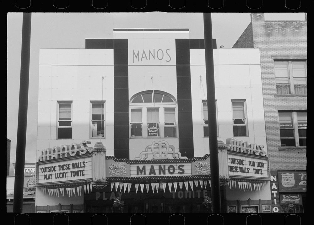 Movie theatre, Elkins, West Virginia. There are two movies in town, both offer games of chance three nights a week to drum…
