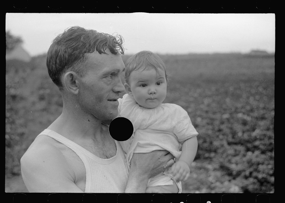 [Untitled photo, possibly related to: Father and daughter at Tygart Valley Homesteads, West Virginia]. Sourced from the…
