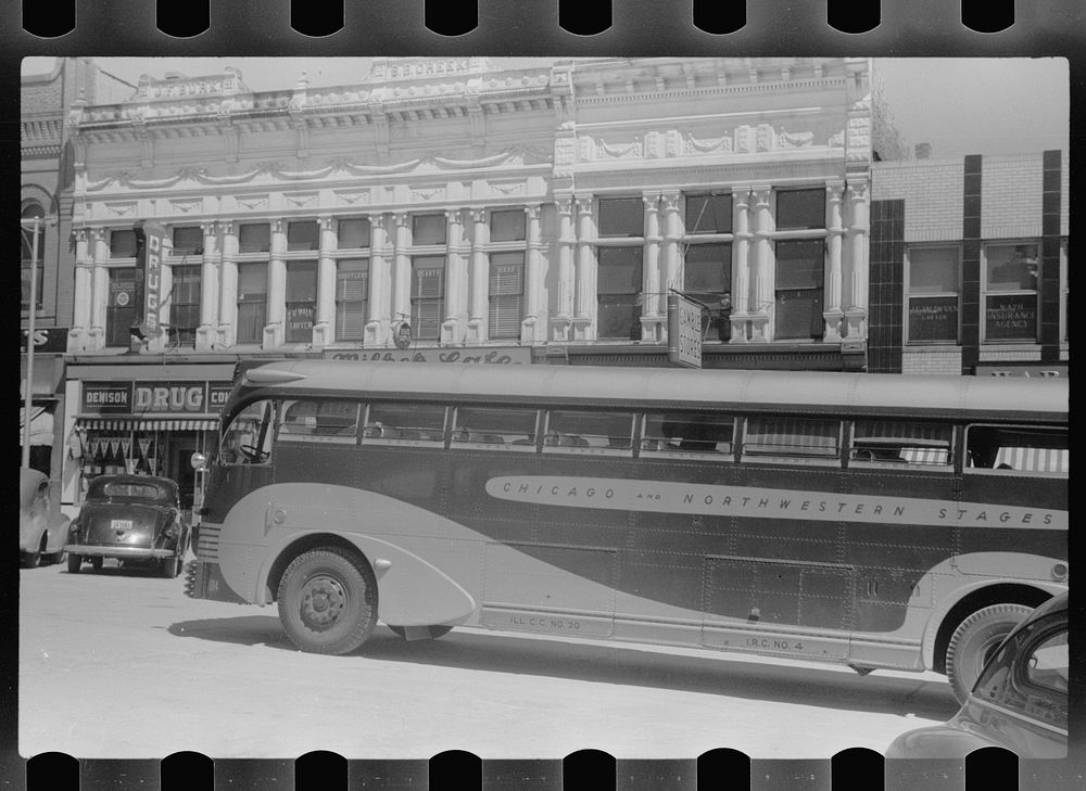 [Untitled photo, possibly related to: Bus going through Denison, Iowa]. Sourced from the Library of Congress.
