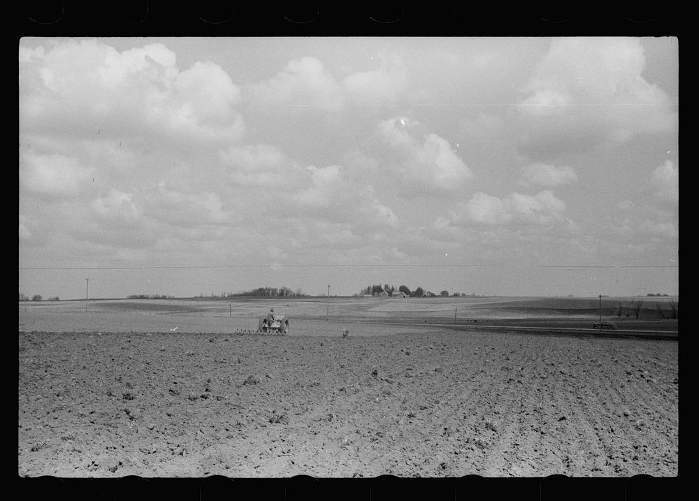[Untitled photo, possibly related to: Boy operating tractor, Grundy County, Iowa]. Sourced from the Library of Congress.