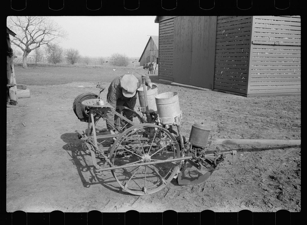 [Untitled photo, possibly related to: Oiling planter preparatory to corn planting, Jasper County, Iowa]. Sourced from the…