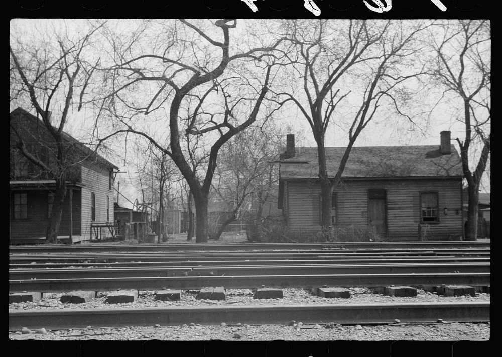 Houses on the other side of the tracks, Dubuque, Iowa. Sourced from the Library of Congress.