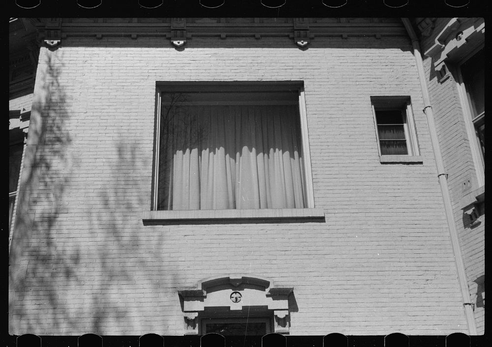 [Untitled photo, possibly related to: Window in funeral home. Dubuque, Iowa]. Sourced from the Library of Congress.