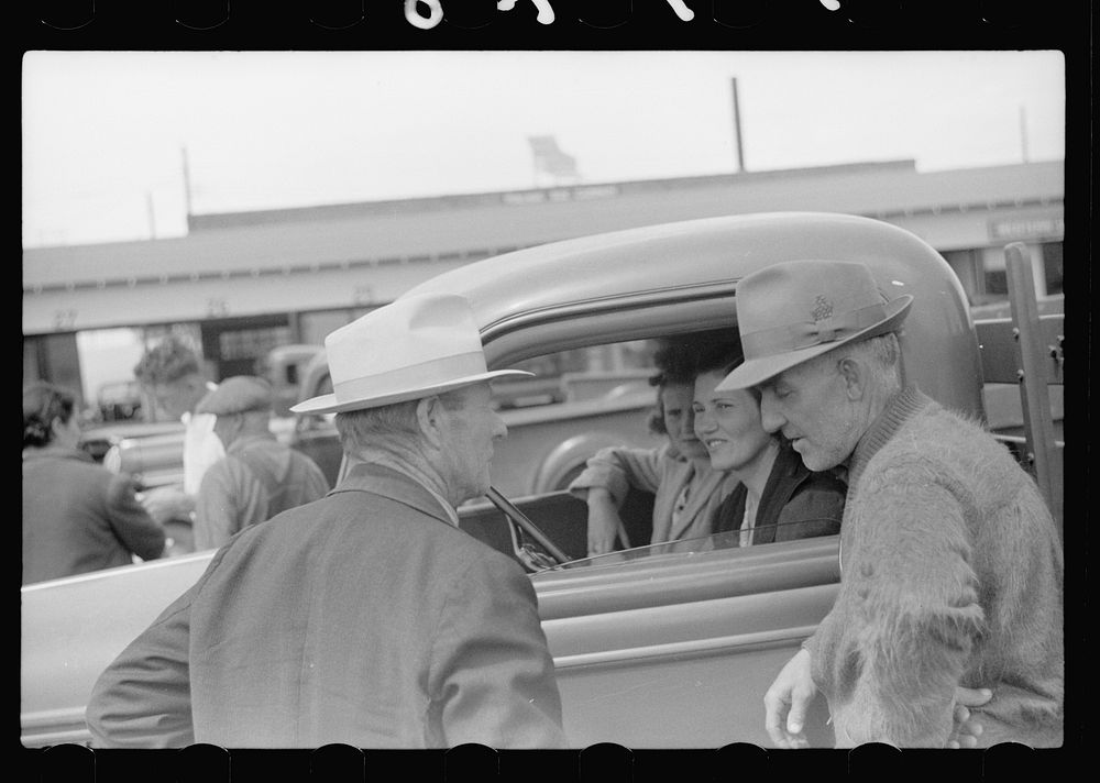 [Untitled photo, possibly related to: Visitor at fruit market, Benton Harbor, Michigan]. Sourced from the Library of…