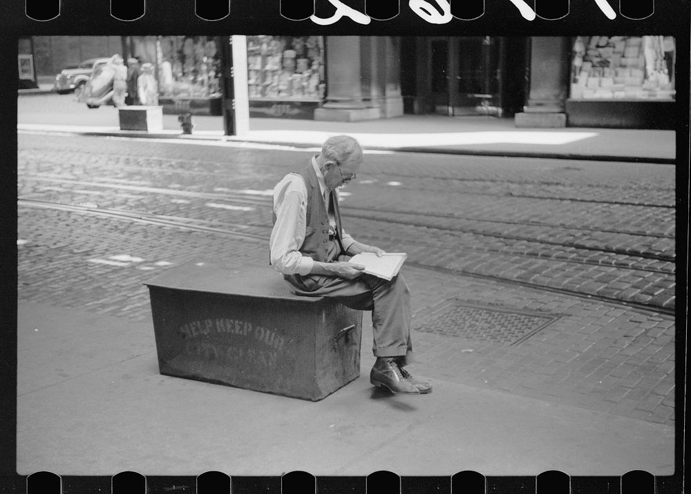 Man waiting for street car, Chicago, Illinois. Sourced from the Library of Congress.