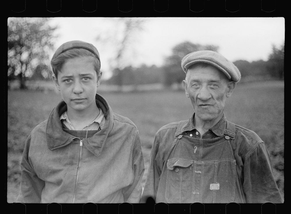 Father and son from Chicago picking strawberries in Berrien County, Michigan. Sourced from the Library of Congress.