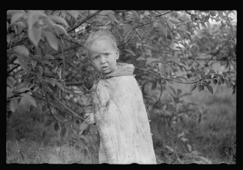 Child of migrant berry pickers, Berrien County, Mich.. Sourced from the Library of Congress.