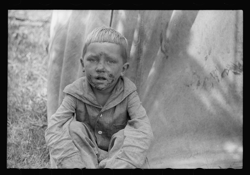 [Untitled photo, possibly related to: Migrant child in front of tent home, Berrien County, Mich.]. Sourced from the Library…