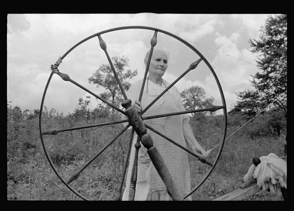 Rehabilitation client at spinning wheel, Ozark Mountains, Arkansas. Sourced from the Library of Congress.