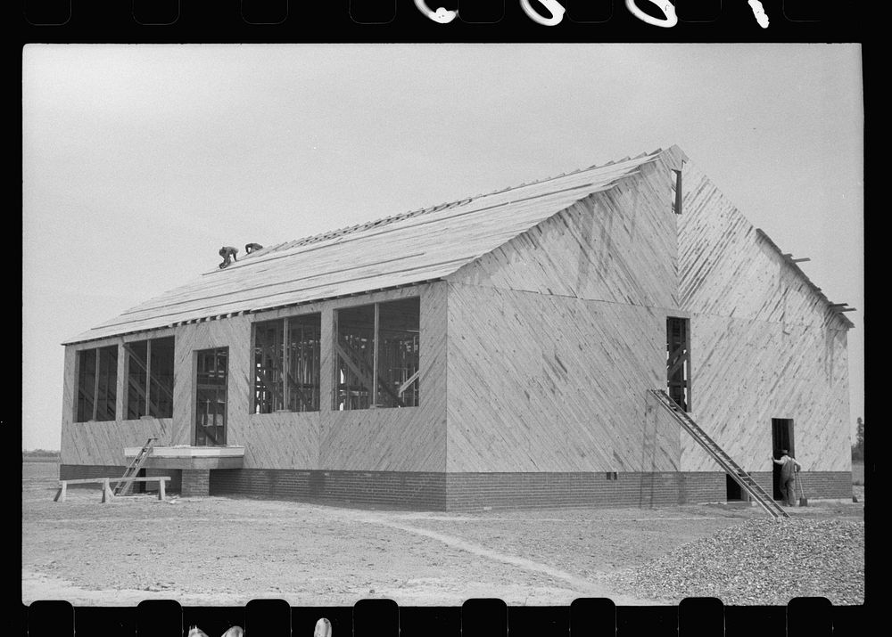 New school and community building under construction at Southeast Missouri Farms. Sourced from the Library of Congress.