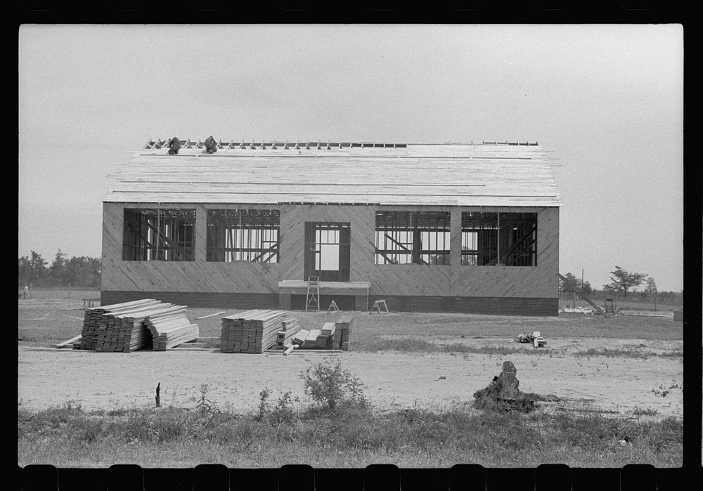 [Untitled photo, possibly related to: New school and community building under construction at Southeast Missouri Farms].…