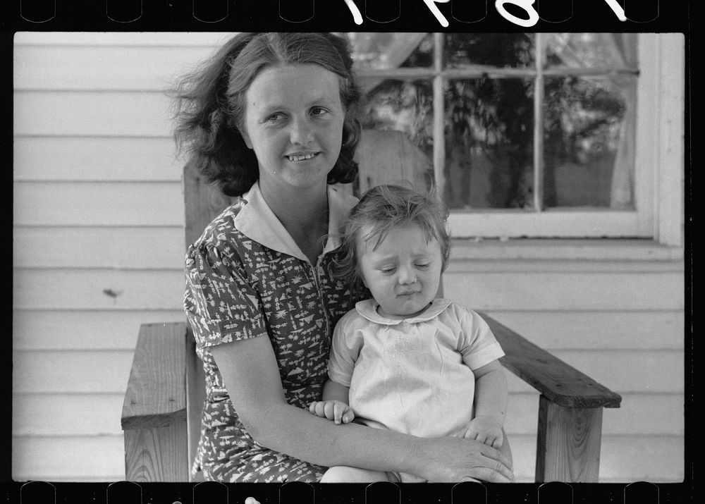 Wife and child of FSA (Farm Security Administration) tenant purchase borrower, Crawford County, Illinois. Sourced from the…