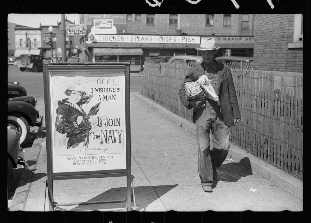 Migrant fruit worker from Arkansas walking by the post office, Benton Harbor, Michigan. Sourced from the Library of Congress.