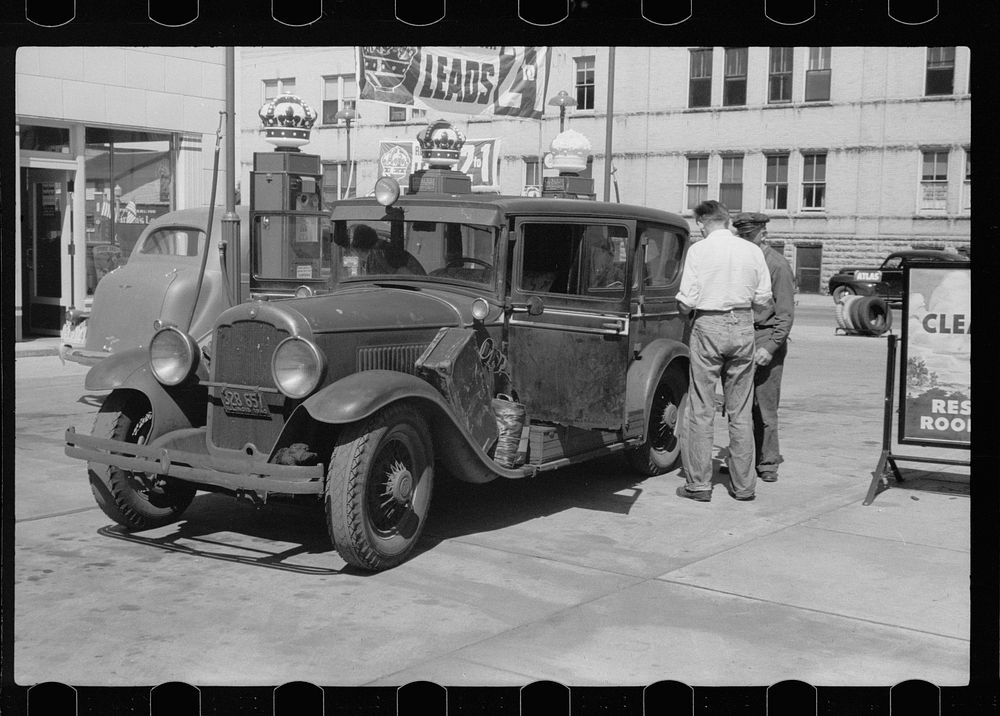 [Untitled photo, possibly related to: Auto of migrant fruit worker at gas station, Sturgeon Bay, Wisconsin]. Sourced from…