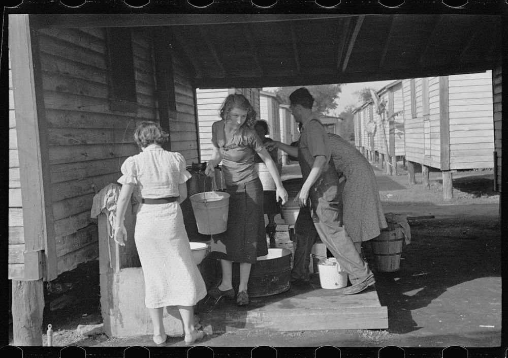 Source of water supply in the camp for migratory workers at Belle Glade, Florida. Sourced from the Library of Congress.