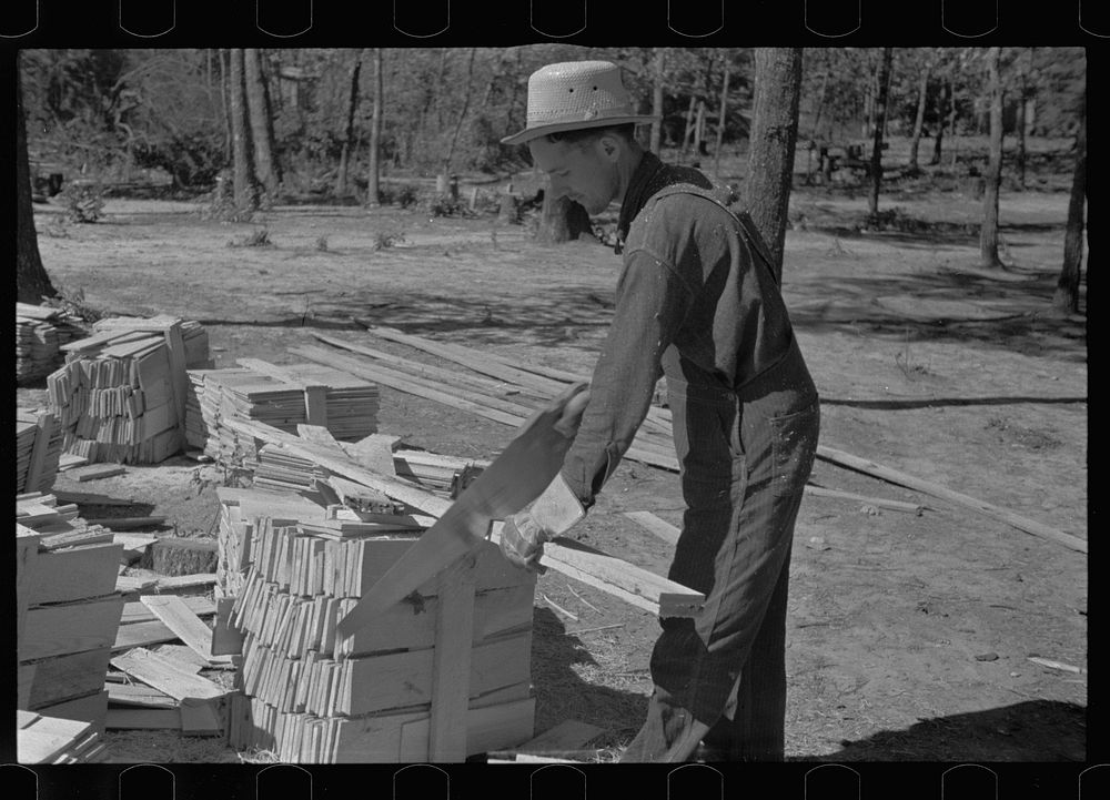 [Untitled photo, possibly related to: Cutting wood for shingles, Jackson County, Alabama]. Sourced from the Library of…