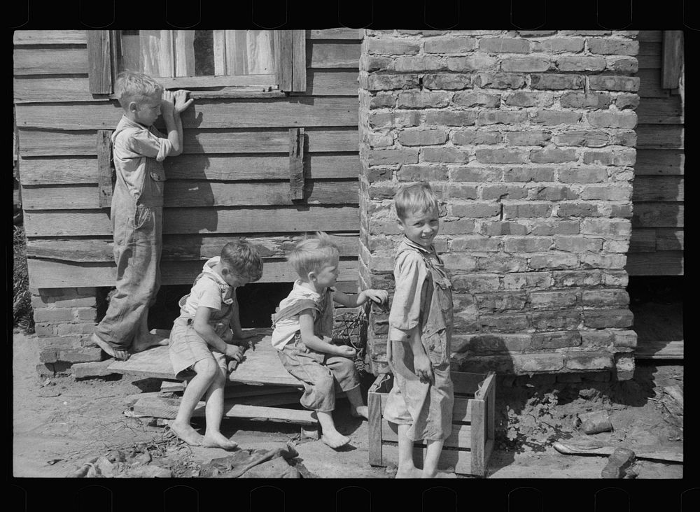 Children of resettled farmer who has been moved into a new house, Wolf Creek Farms, Grady County, Georgia. Sourced from the…