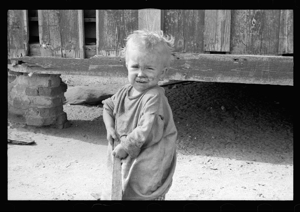 [Untitled photo, possibly related to: Child of North Carolina sharecropper]. Sourced from the Library of Congress.