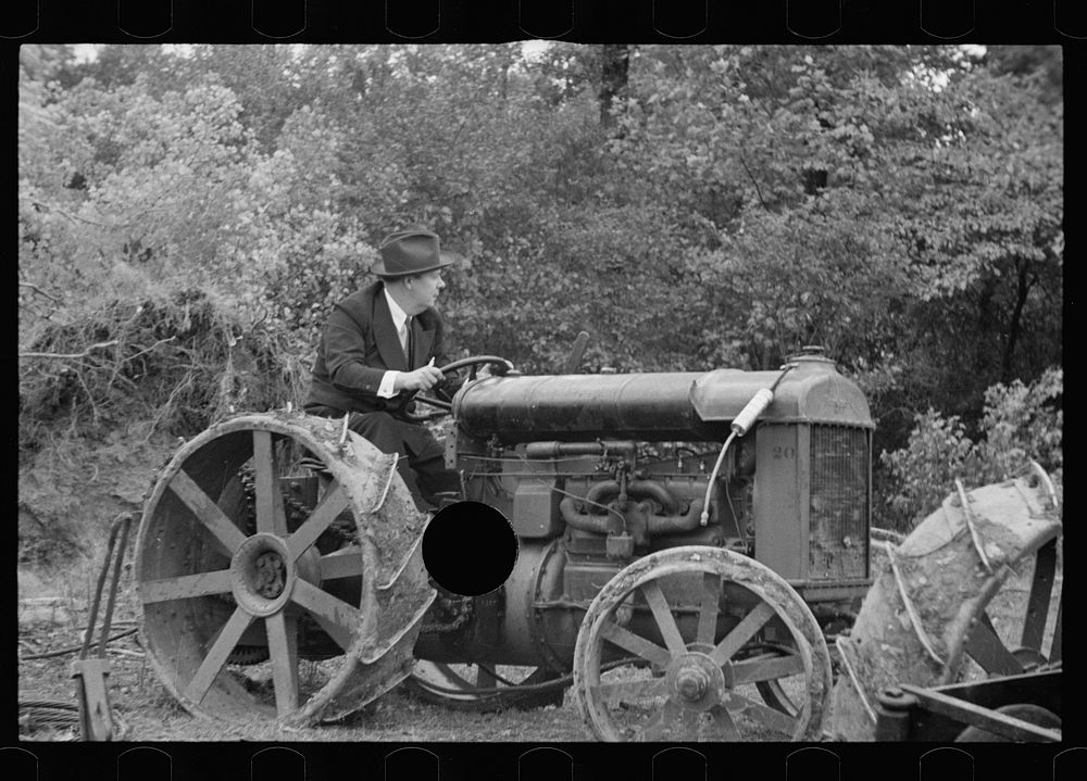 [Untitled photo, possibly related to: Commissioner Allen operating tractor, Berwyn, Maryland]. Sourced from the Library of…
