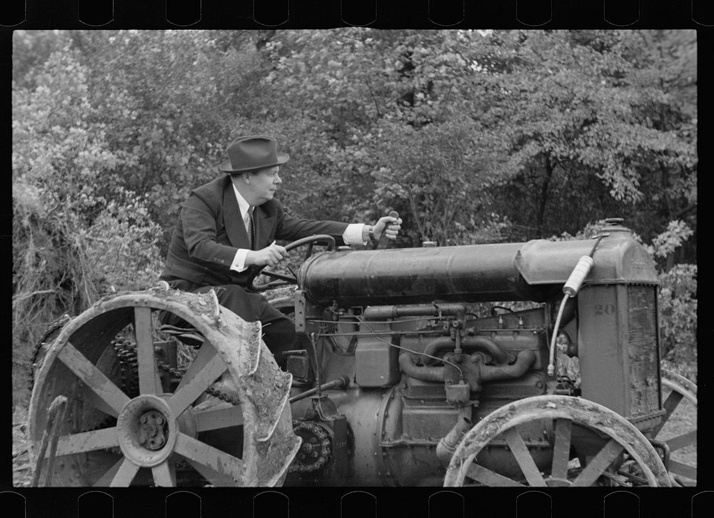Commissioner Allen operating tractor, Berwyn, Maryland. Sourced from the Library of Congress.