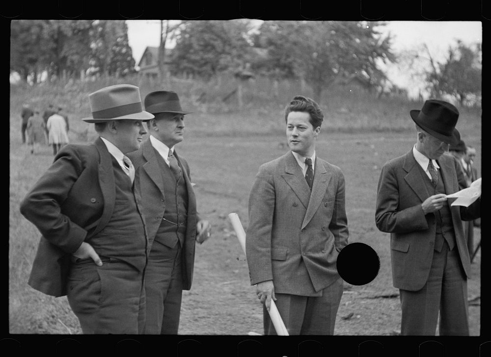 [Untitled photo, possibly related to: Resettlement officers at opening of Berwyn Project, Maryland]. Sourced from the…