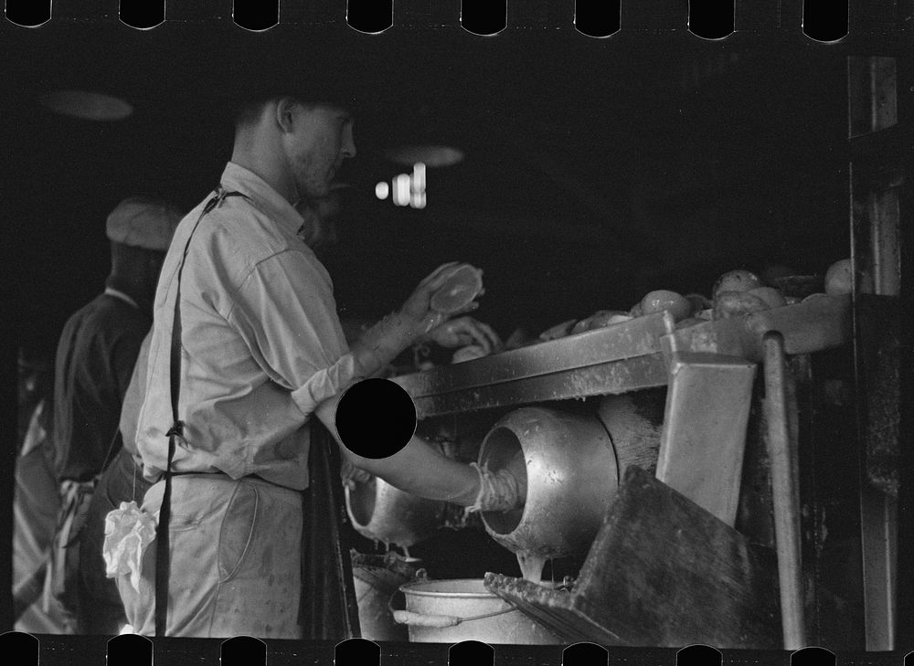 [Untitled photo, possibly related to: An employee of the grapefruit canning plant at Winter Haven, Florida]. Sourced from…