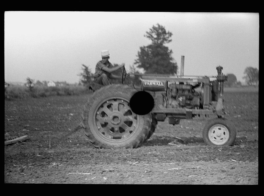 [Untitled photo, possibly related to: Tractors used in cultivation, Wabash Farms, Indiana]. Sourced from the Library of…