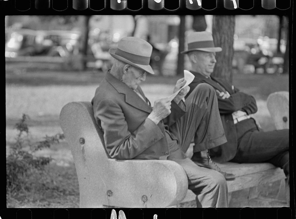 [Untitled photo, possibly related to: Men in park, Peoria, Illinois]. Sourced from the Library of Congress.