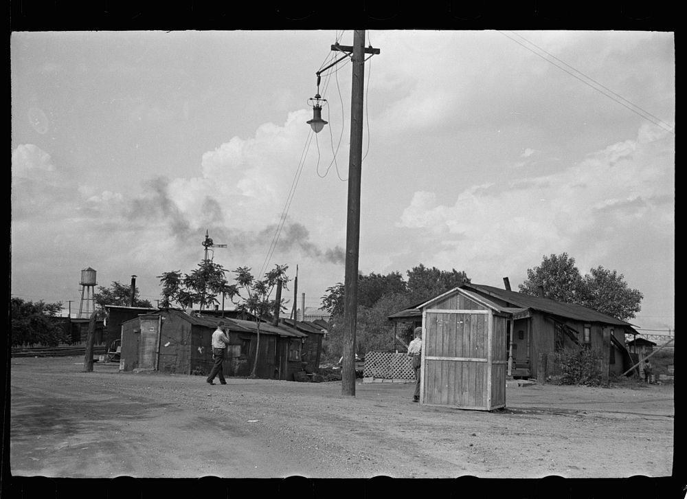 [Untitled photo, possibly related to: Slums at Cinder Point between railroad and Illinois River, Peoria, Illinois]. Sourced…