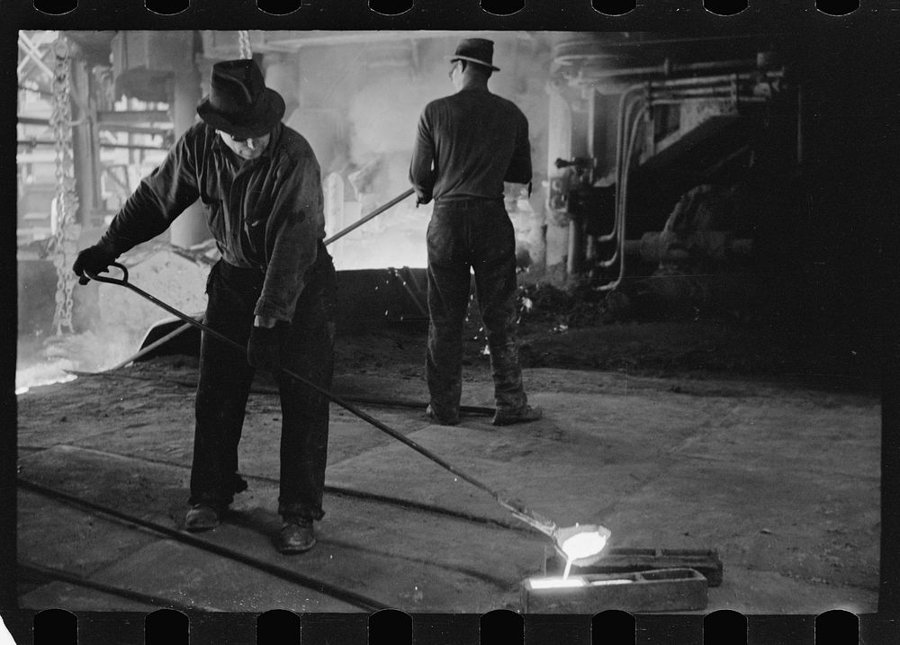 Pouring a test mold while blast furnace is being tapped, Pittsburgh, Pennsylvania. Sourced from the Library of Congress.