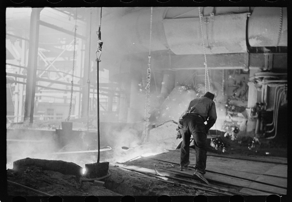 Pouring a test mold while blast furnace is being tapped, Pittsburgh, Pennsylvania. Sourced from the Library of Congress.