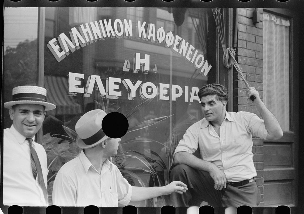 [Untitled photo, possibly related to: Steelworkers talking to the proprietor of a coffee shop whose name dedicates it to…