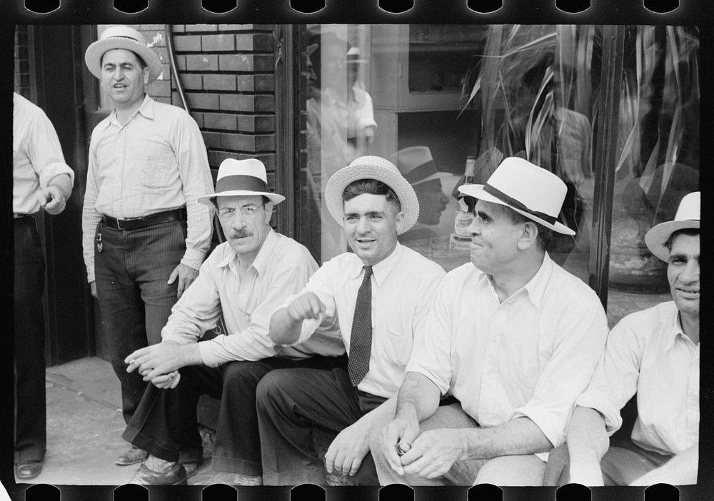 A group of steelworkers discussing politics, Aliquippa, Pennsylvania. Sourced from the Library of Congress.