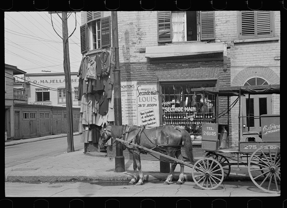 Pawnshop and milk wagon, Québec, Canada. Sourced from the Library of Congress.
