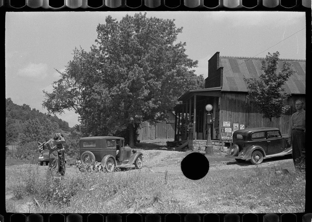 [Untitled photo, possibly related to: Resting in front of general store, Blankenship, Martin County, Indiana]. Sourced from…