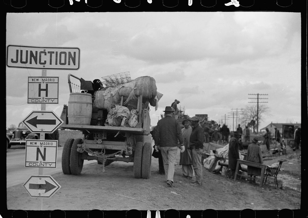 [Untitled photo, possibly related to: New Madrid County, Missouri. State highway officials moving sharecroppers away from…