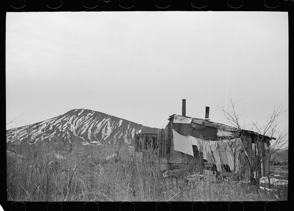 [Untitled photo, possibly related to: A shanty built of refuse near the Sunnyside slack pile, Herrin, Illinois Many…