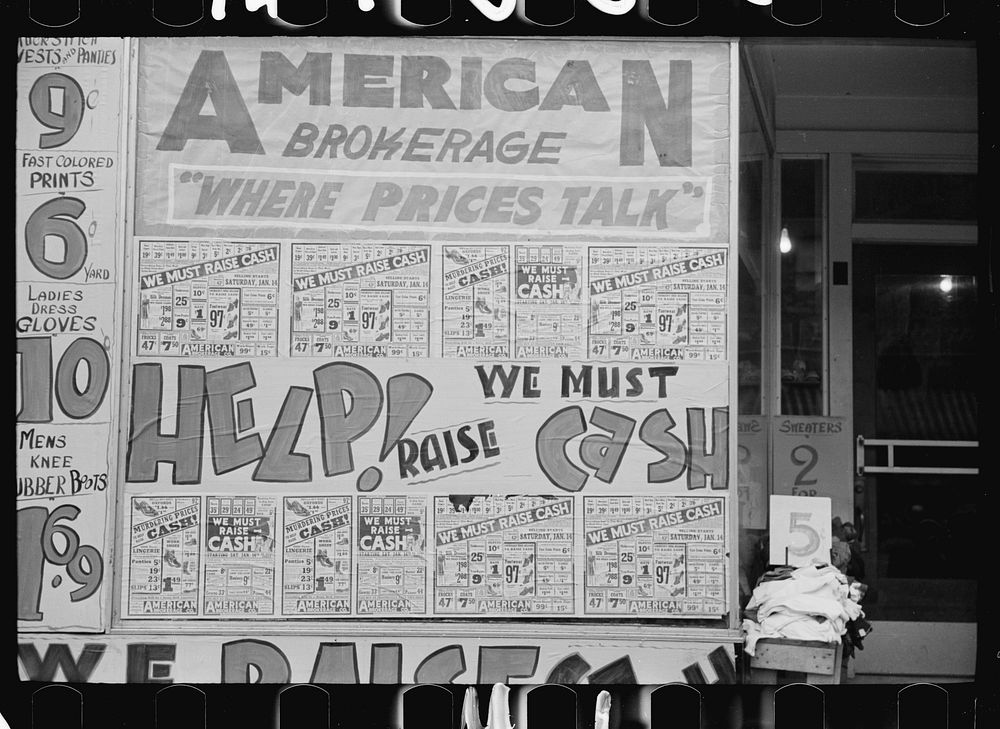 Storefront, West Frankfort, Illinois. Window of advertising: "We must help raise cash!". Sourced from the Library of…