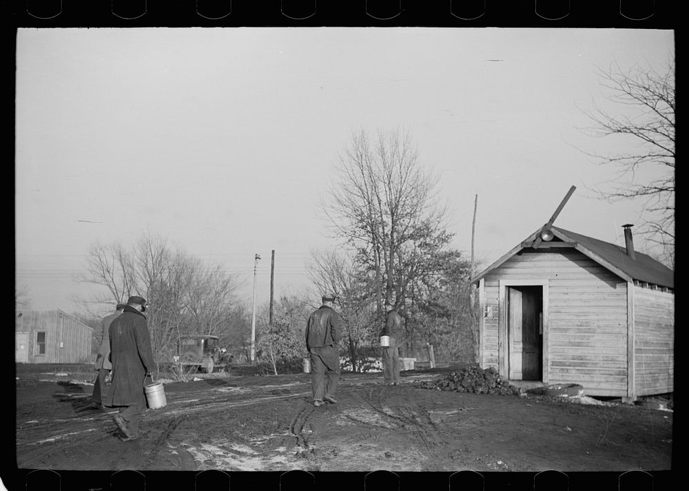[Untitled photo, possibly related to: Gopher hole miner checking out at end of day's work. Williamson County, Illinois (see…