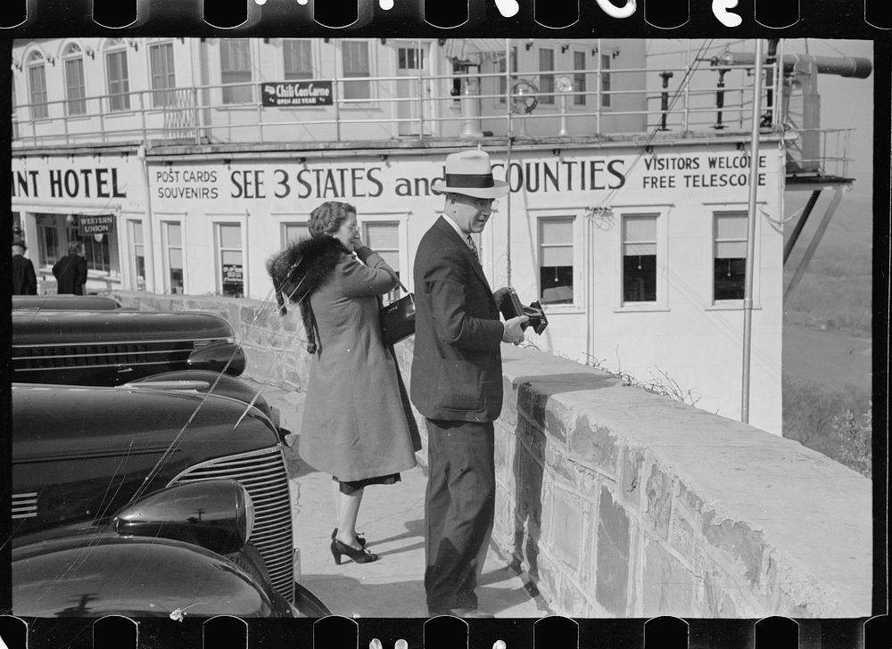 Tourist and his wife looking at the view, Allegheny Mountains, Pennsylvania. Sourced from the Library of Congress.