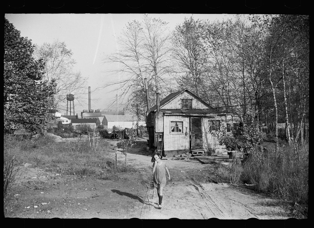 Lack of proper housing forces mill workers into shacks along river, Millville, New Jersey. Sourced from the Library of…