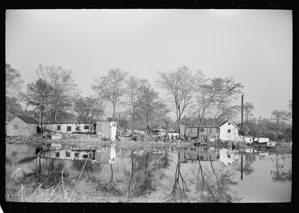 [Untitled photo, possibly related to: Lack of proper housing forces mill workers into shacks along river, Millville, New…