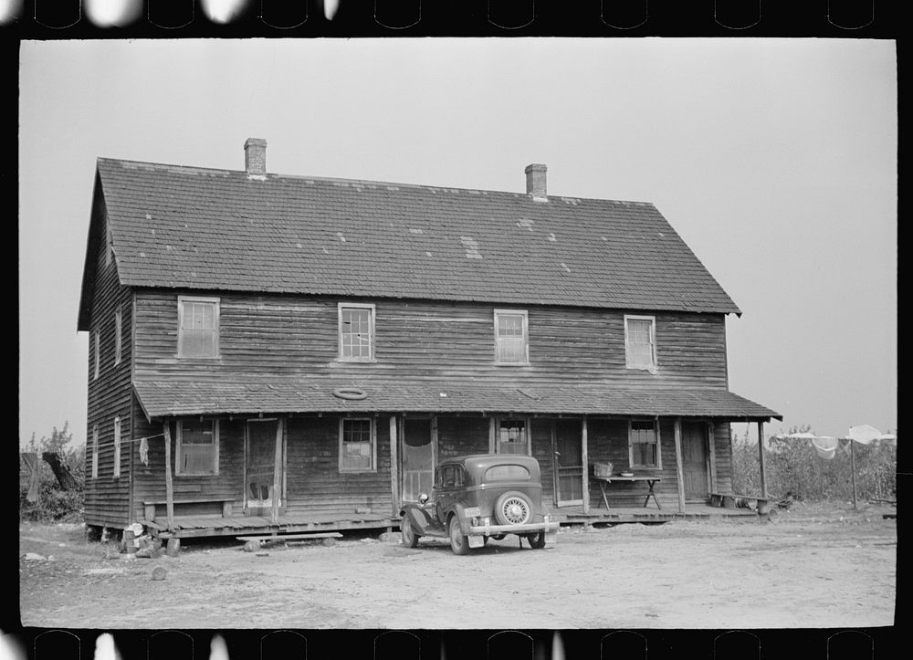 House in which many families of cranberry workers live, Burlington County, New Jersey. Sourced from the Library of Congress.