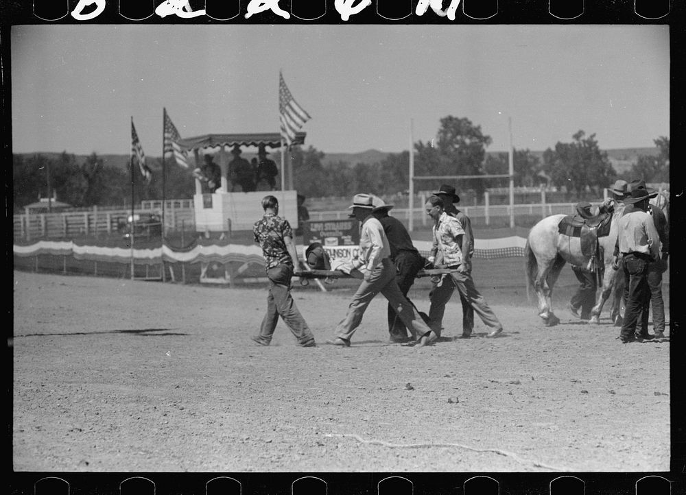 [Untitled photo, possibly related to: Riding a bucking horse, rodeo, Miles City, Montana]. Sourced from the Library of…