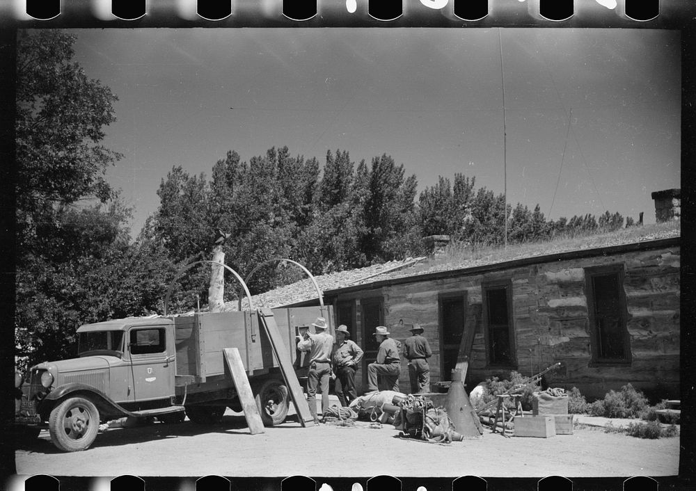 [Untitled photo, possibly related to: Loading the roundup trucks, Quarter Circle U Ranch, Big Horn County, Montana]. Sourced…