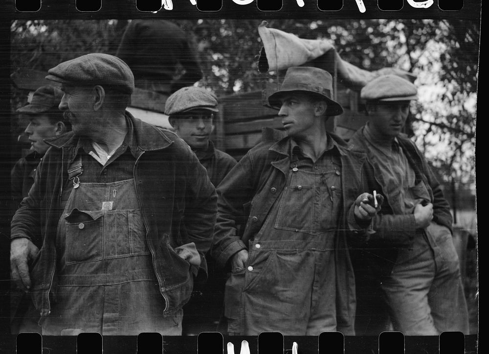 [Untitled photo, possibly related to: Farmers at cornhusking contest, Marshall County, Iowa]. Sourced from the Library of…