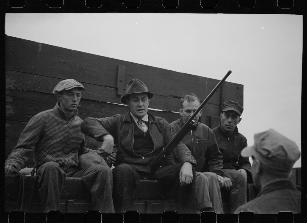 County agent with starting gun, cornhusking contest, Marshall County, Iowa. Sourced from the Library of Congress.