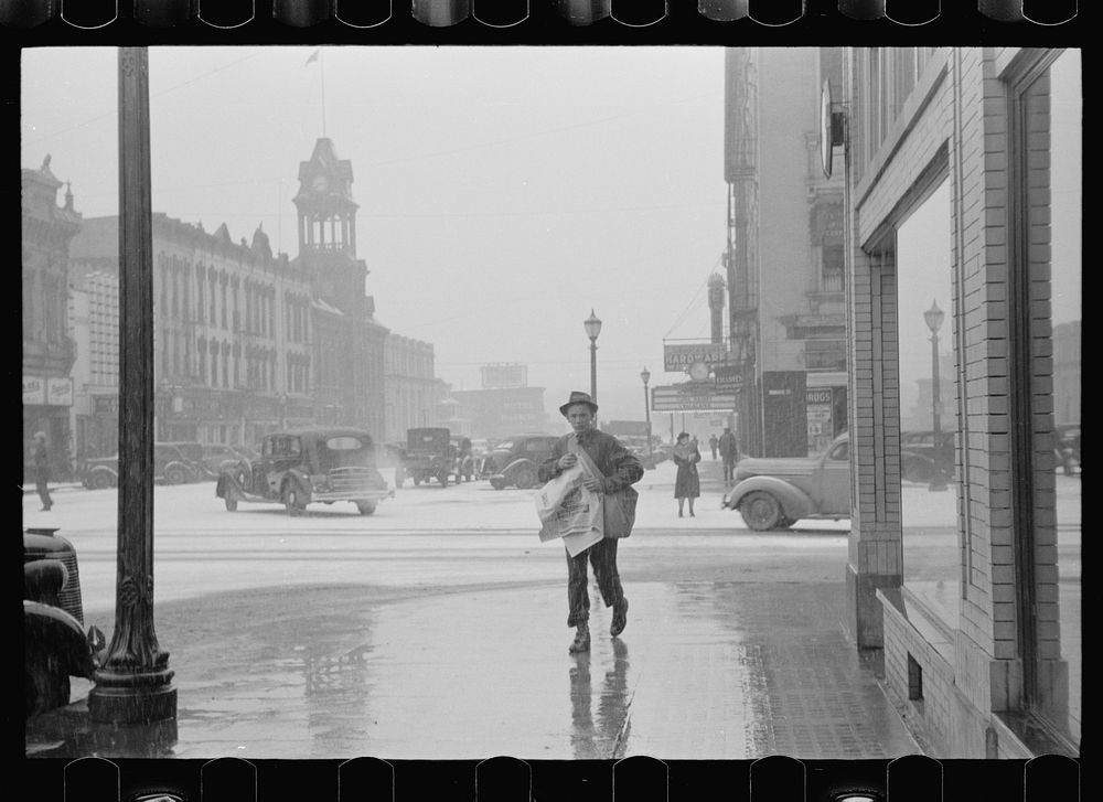 Newsboy, Iowa City, Iowa. Sourced from the Library of Congress.