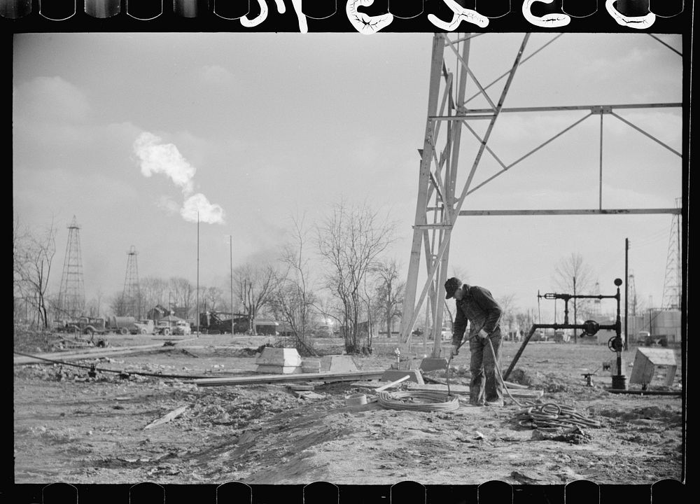Oil field worker, Marion County, Illinois. Sourced from the Library of Congress.